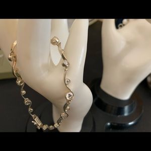 Two sterling silver bracelets.